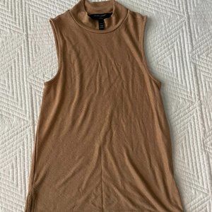 Sleeveless mockneck